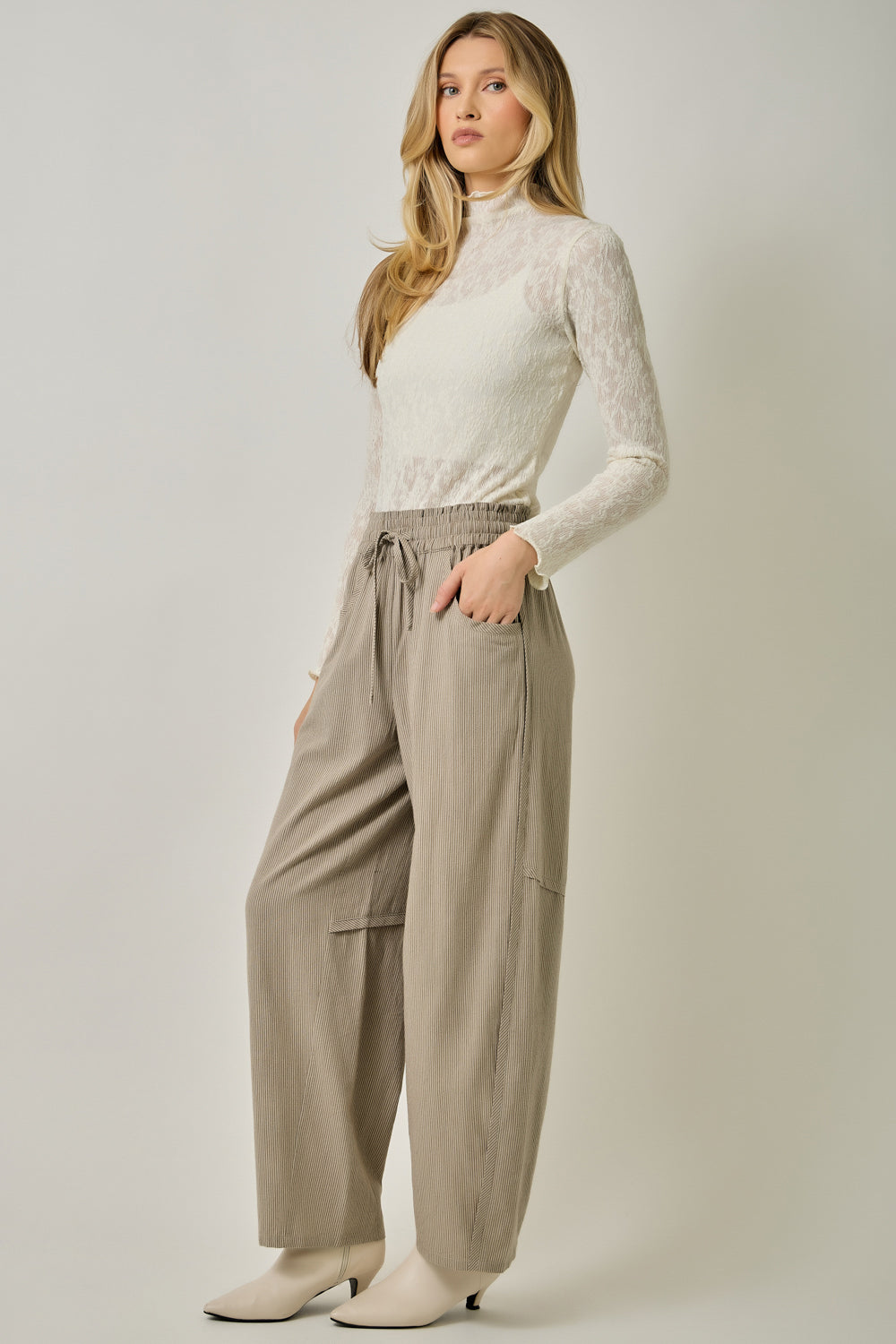 Pinstripe Barrel Pants in smokey taupe — relaxed barrel leg silhouette, back view
