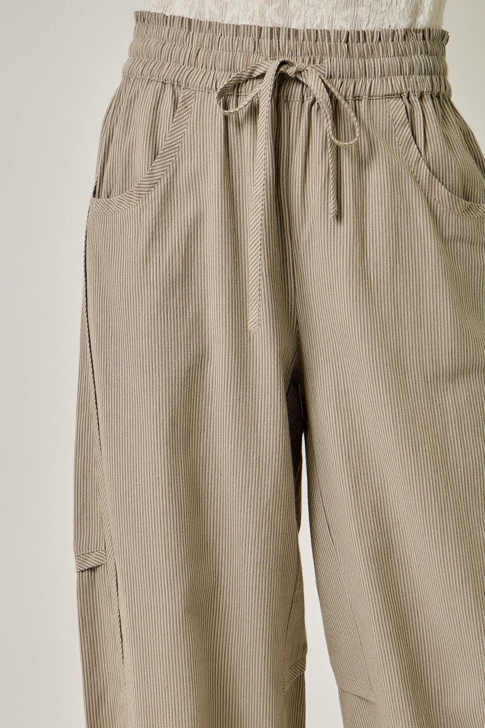 Pinstripe Barrel Pants in smokey taupe — barrel leg pull-on pants with ruched ruffle waist, detail view