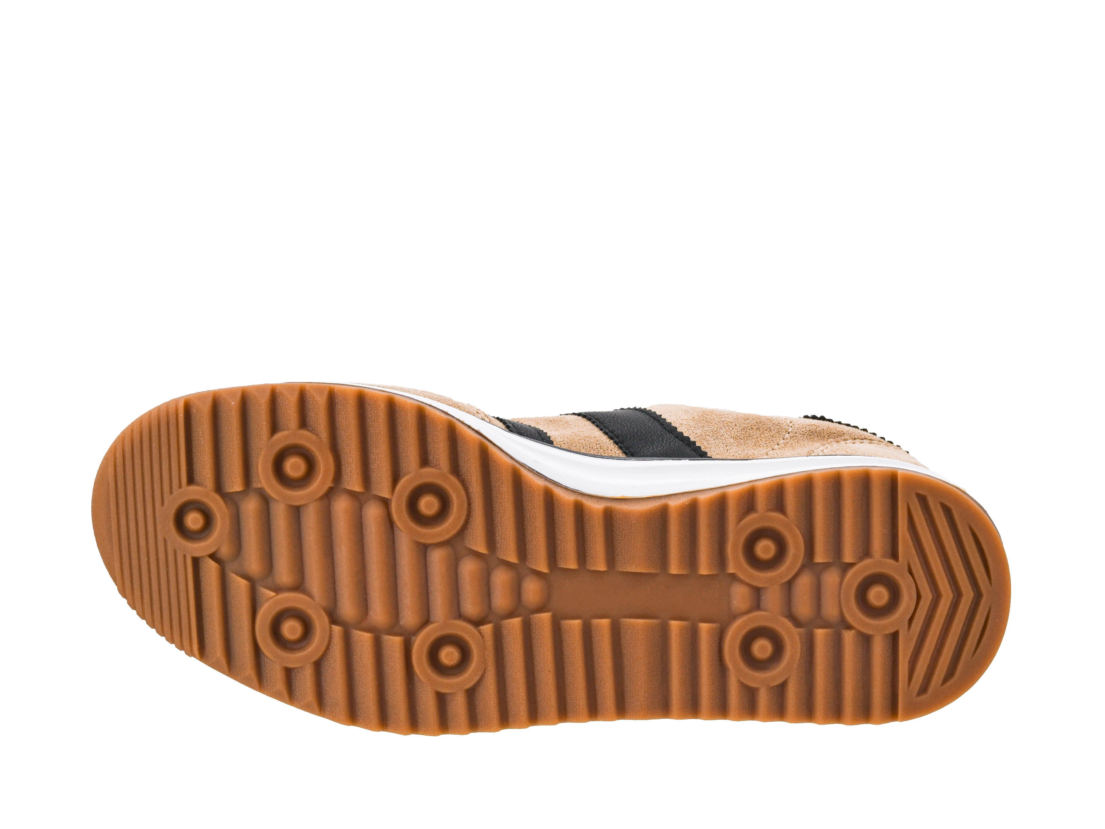 Close-up of a shoe sole with brown tread pattern on a white background