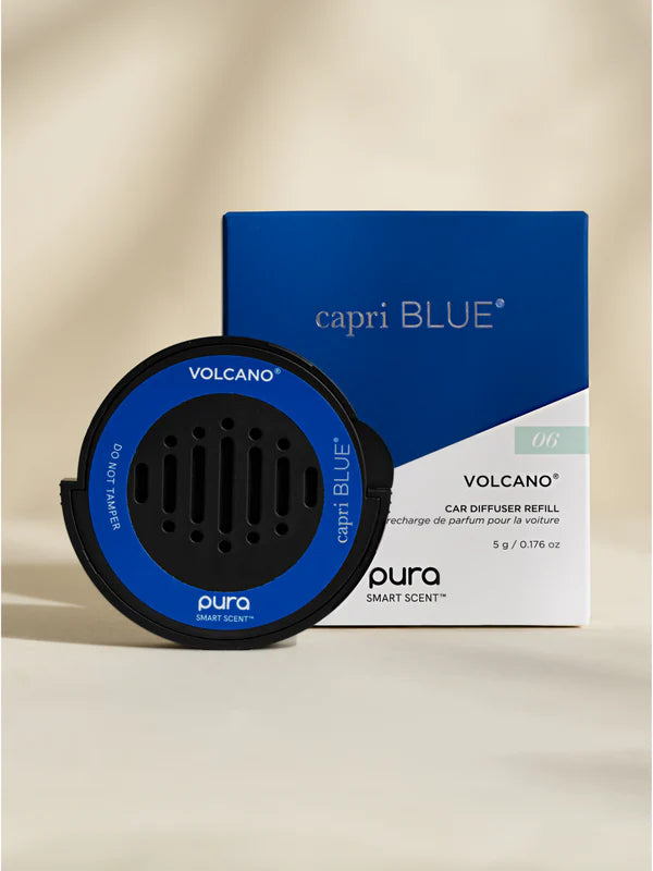 Pura Volcano car diffuser refill and packaging on a beige background