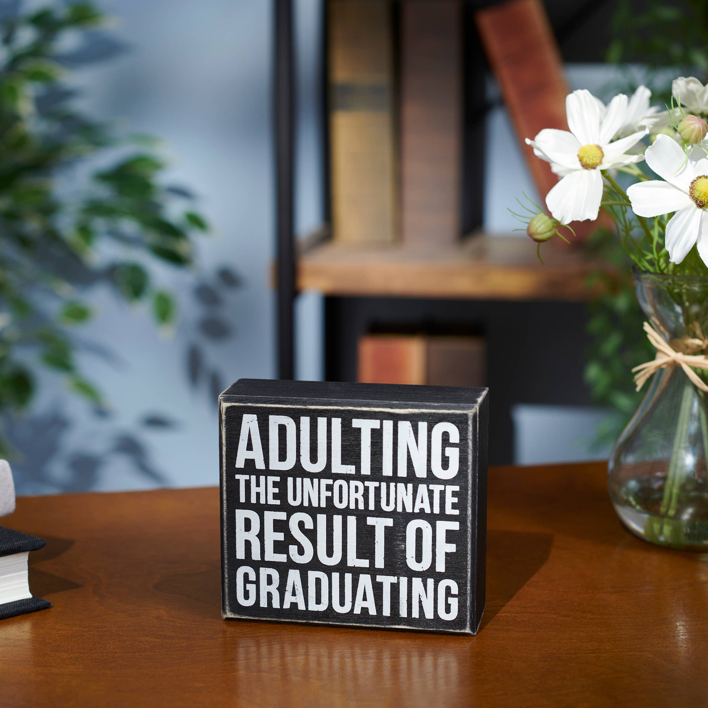 Unfortunate Result of Graduating Box Sign