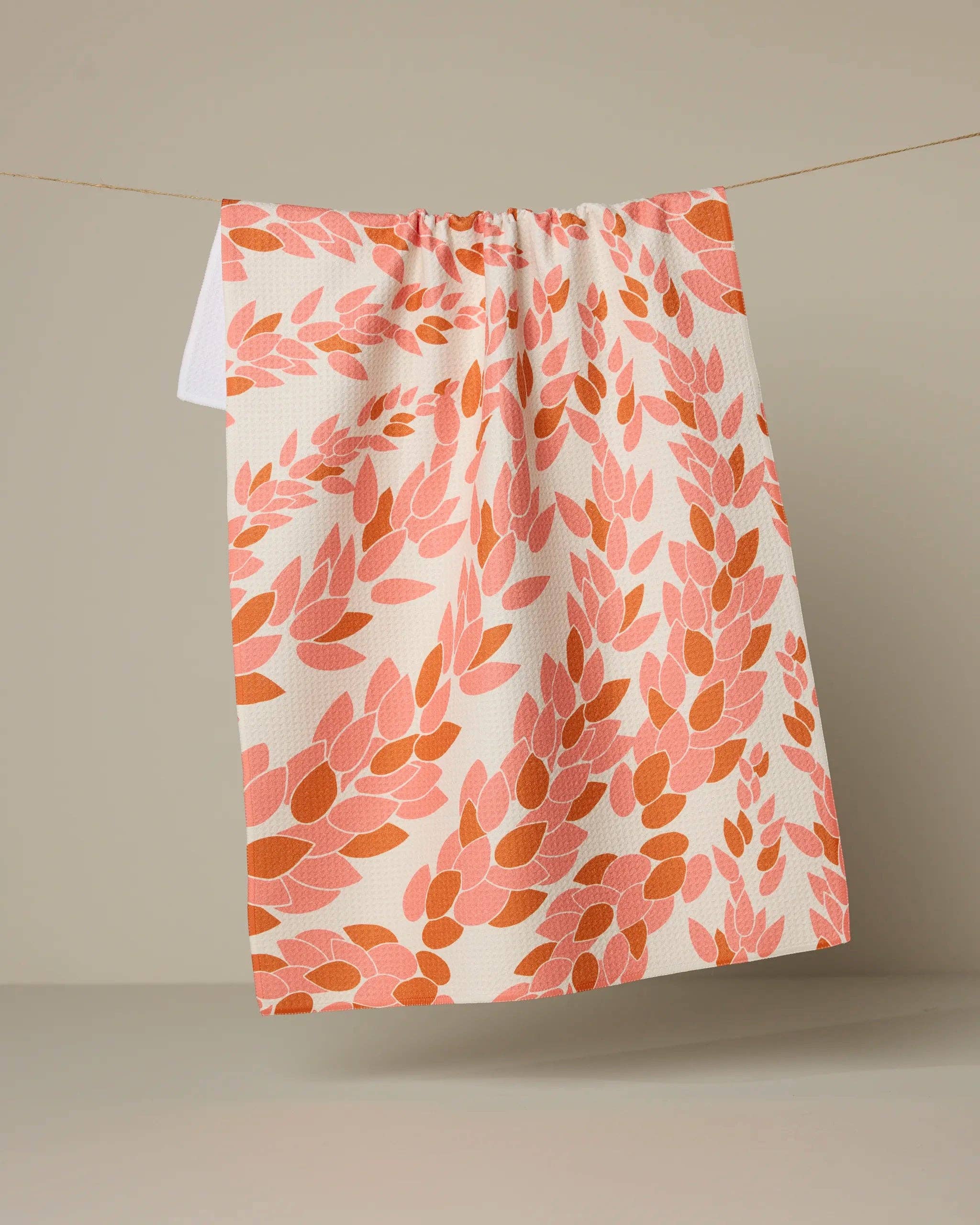 Coral and orange patterned eco-friendly kitchen tea towel by Geometry