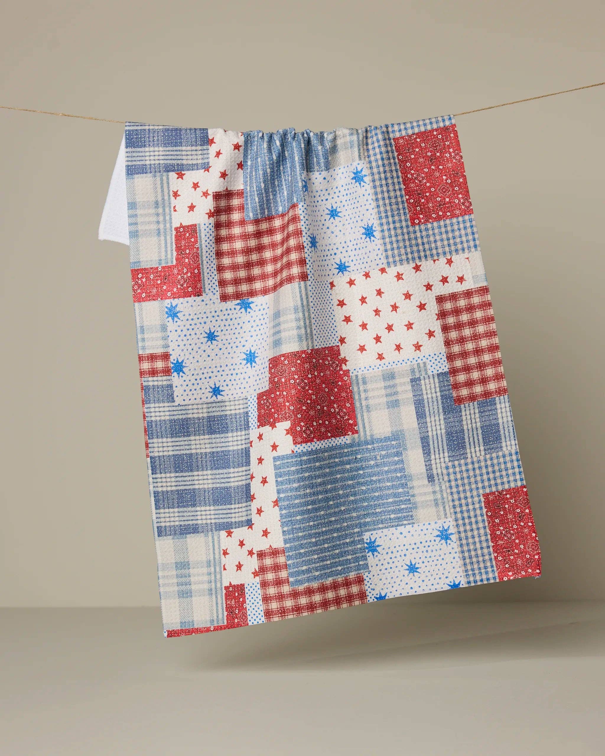 Geometry Stars and Stitches tea towel with patriotic red, white, and blue patchwork pattern