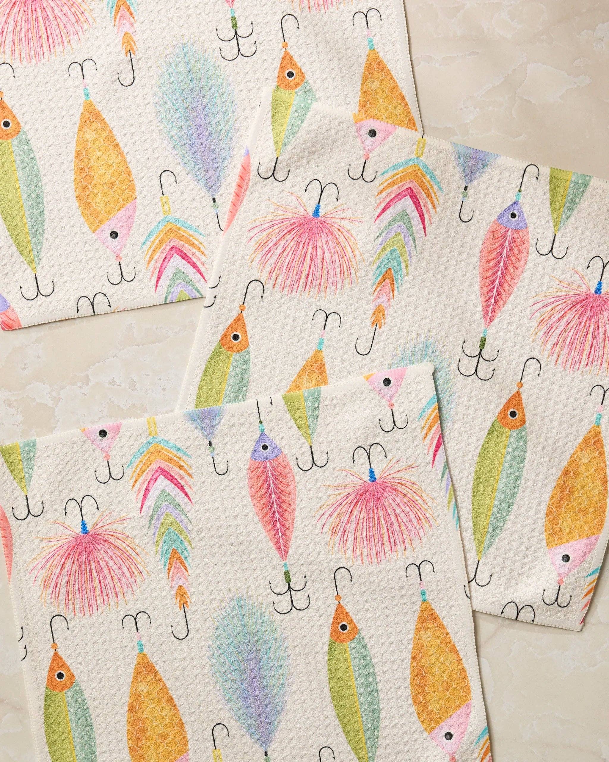 Geometry Tackle Box dishcloth set featuring colorful fishing lure print reusable kitchen cloths close up view