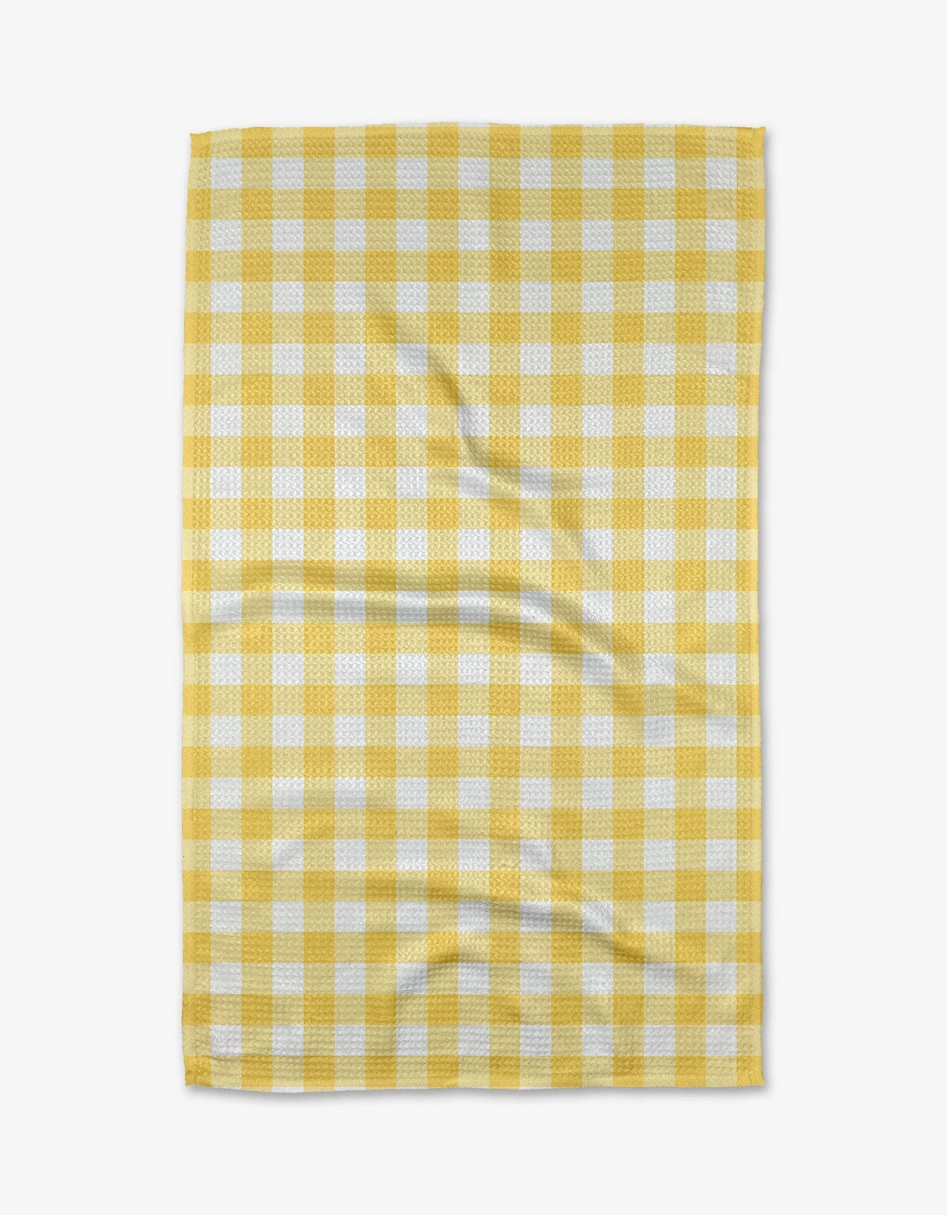 Yellow gingham tea towel with waffle weave texture by Geometry