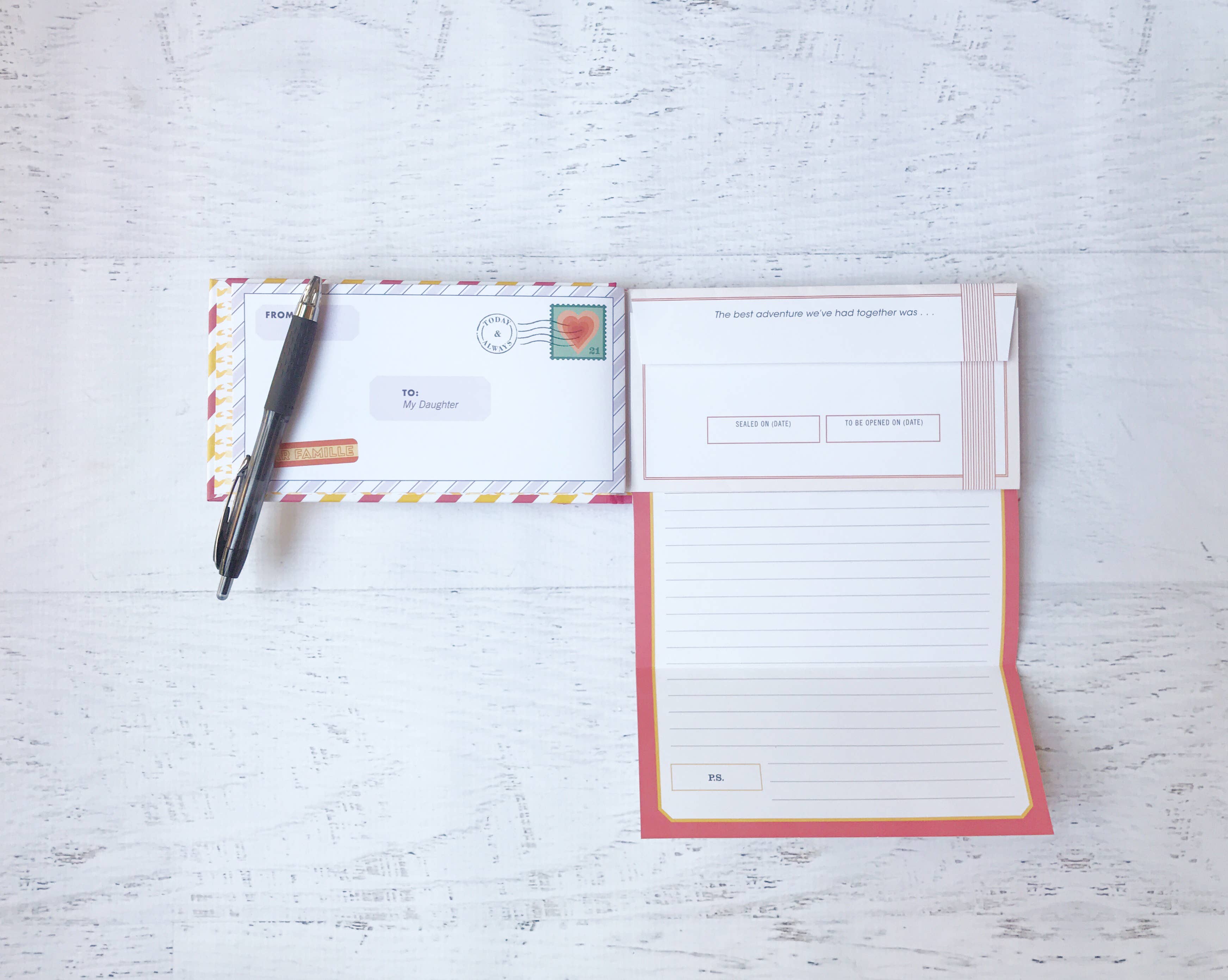 Letters to My Daughter keepsake book featuring 12 prompted letters and sealing stickers for creating a personalized memory gift
