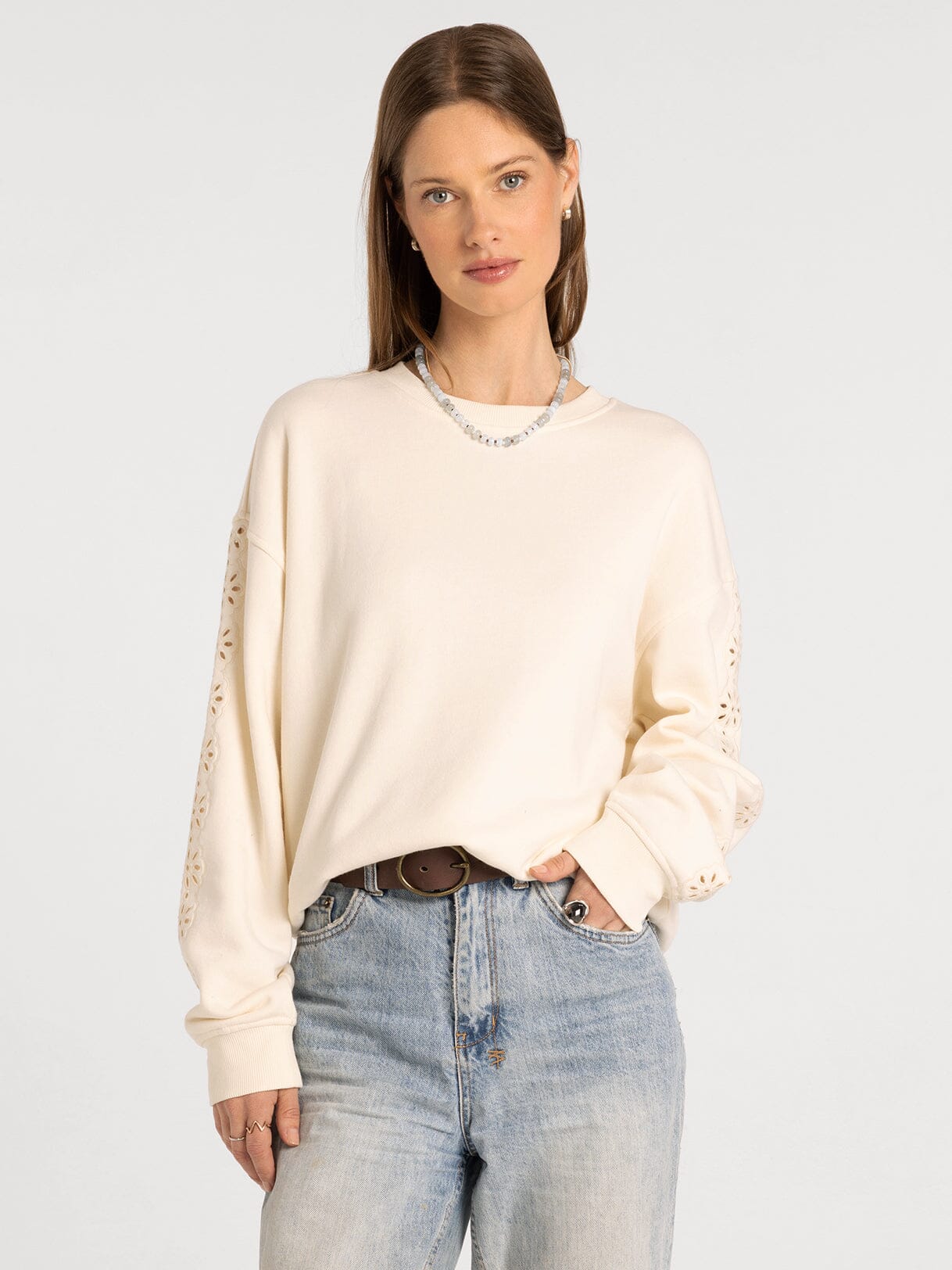Marietta Top in eggnog — women's round neck long sleeve top with embroidered sleeve detail, front view