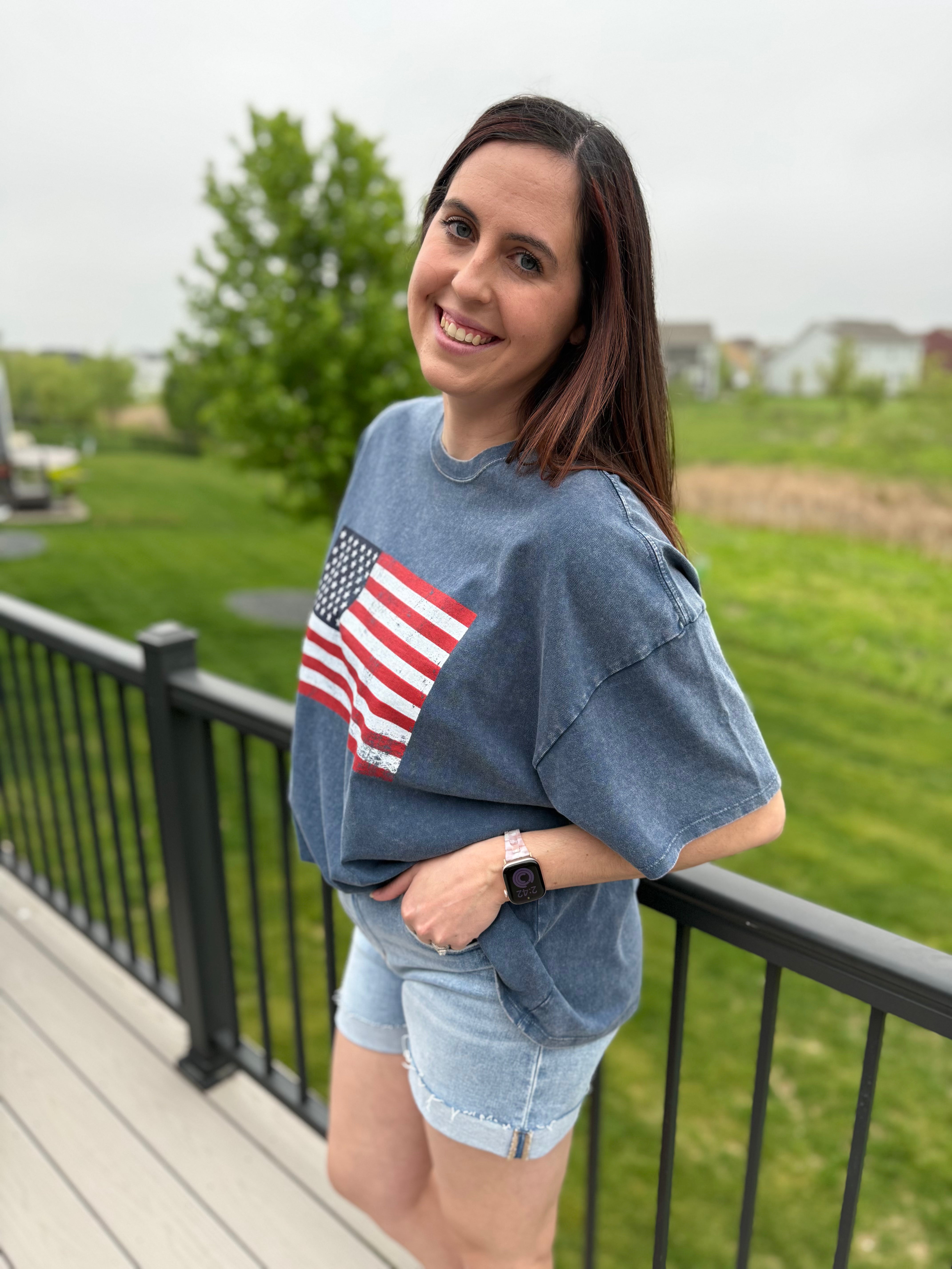 oversized mineral washed patriotic graphic tee with American flag design side view