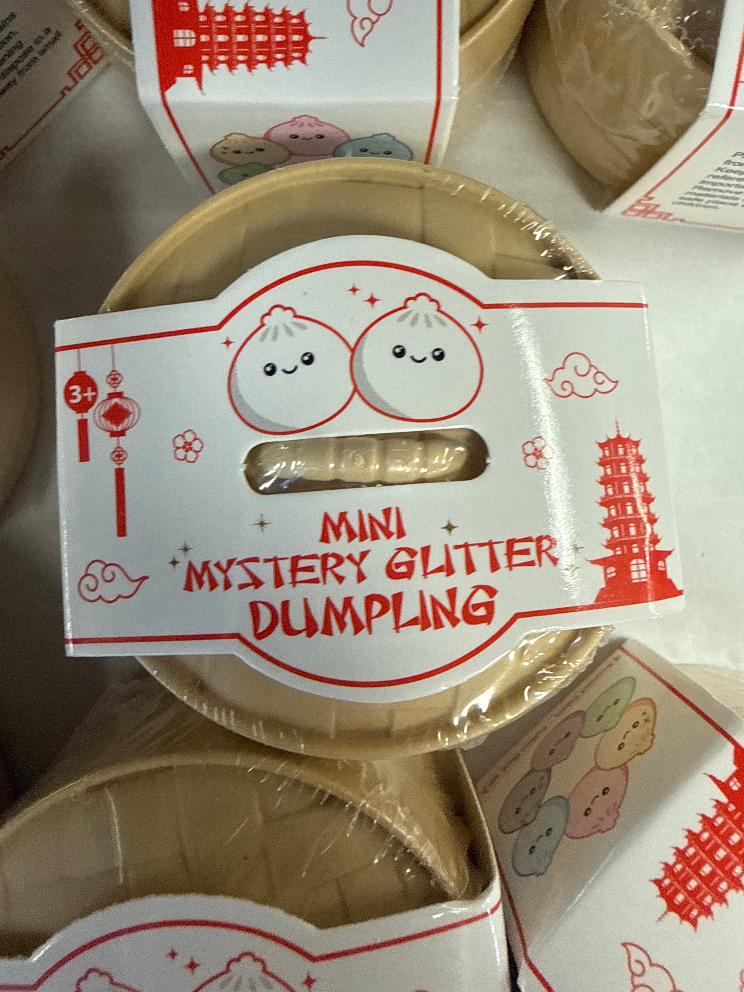 Mini mystery glitter dumpling squishy sensory toy with surprise sparkly color