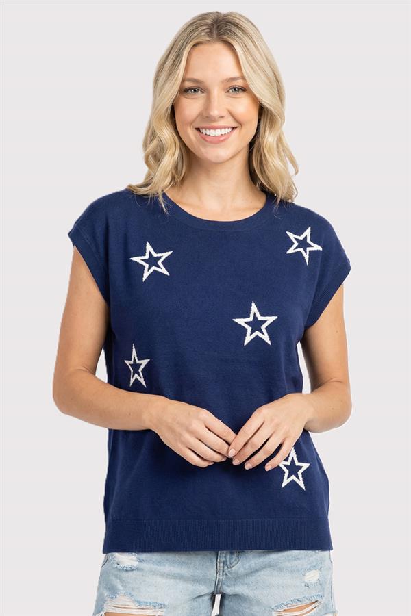 woman wearing navy short sleeve sweater with embroidered stars on front