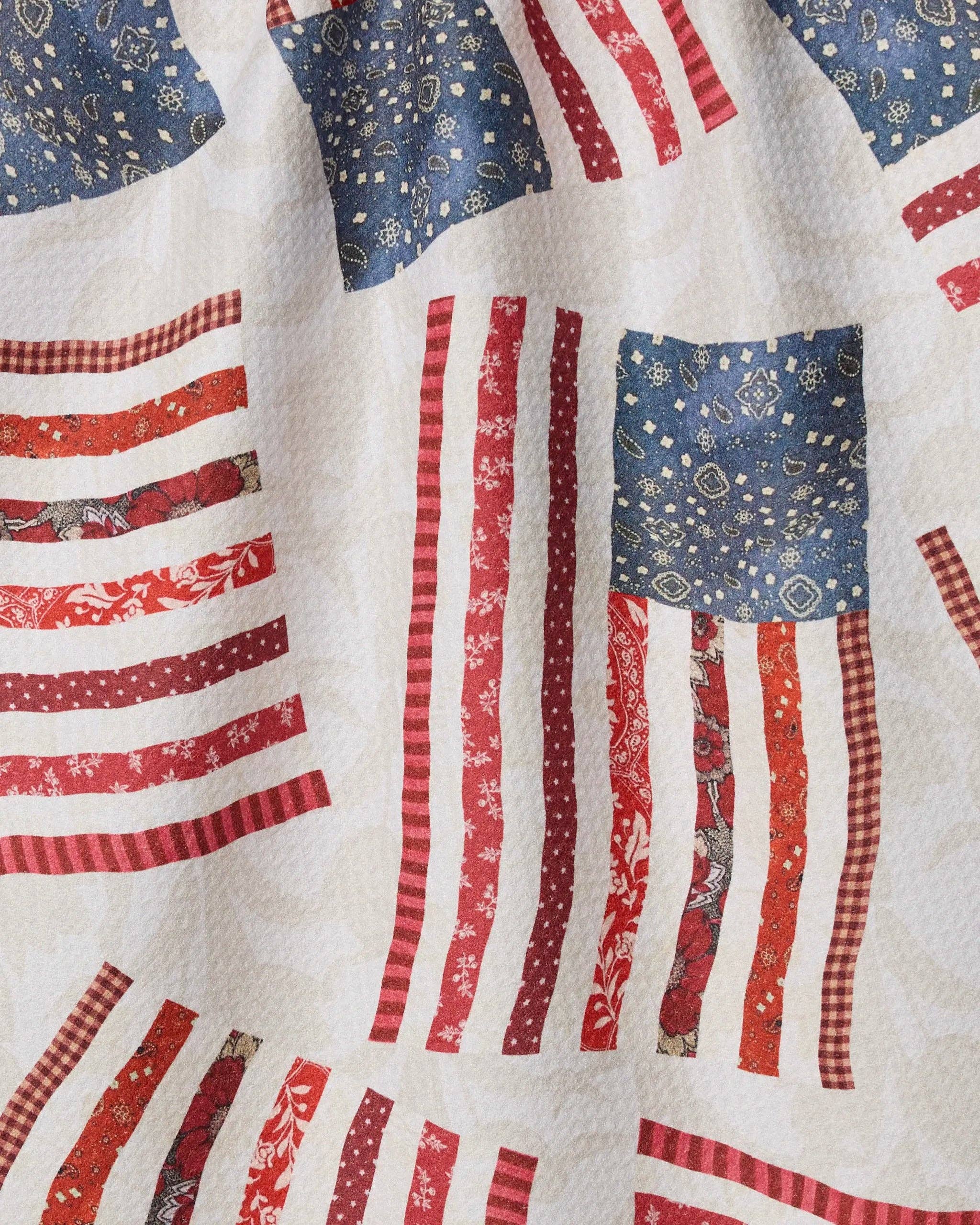 Patchwork Pride tea towel by Geometry, patriotic American flag kitchen towel with white background