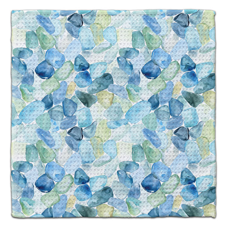 Sea glass inspired eco-friendly waffle weave washcloth with blue and green coastal watercolor pattern by CJ Bella