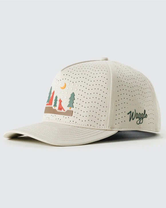 tan Waggle repel hat with wolf forest graphic and perforated panels