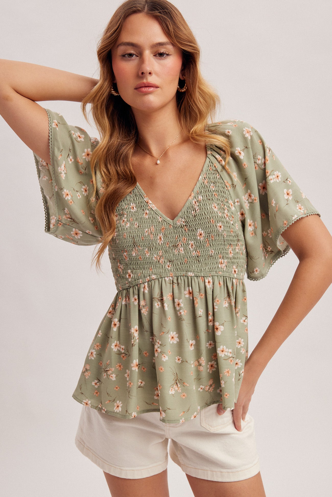 V-Neck Flutter Sleeve Smocked Peplum Top