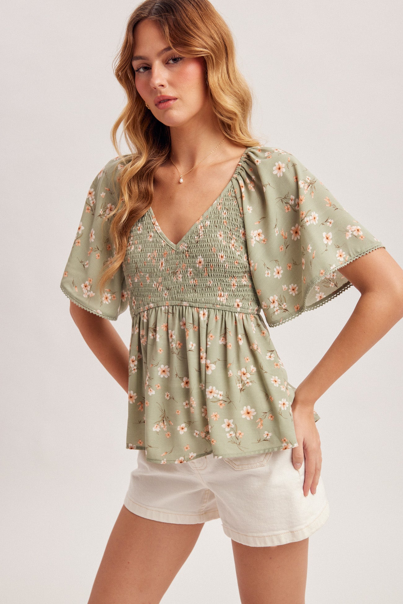 V-Neck Flutter Sleeve Smocked Peplum Top