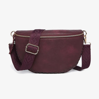  Janae Whipstitch Crossbody Sling Bag in cherry lacquer — half-moon vegan leather bag with whipstitch trim and guitar strap