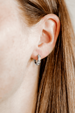 Colette Bezel-Set CZ Huggie Hoop Earrings – 9mm Silver Tone