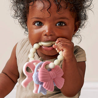 Itzy Trio™ Bow Teething Charms