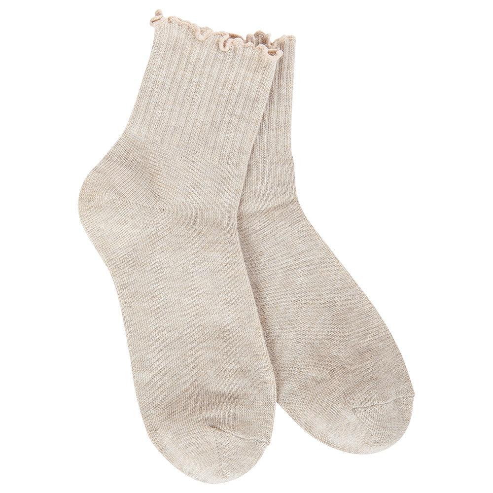 A pair of World's Softest light beige ribbed ankle socks with ruffled trim at the top, displayed against a solid white background.