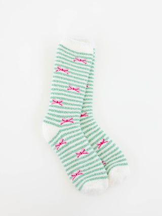 World's Softest women's green and white striped socks with pink bows on a white background