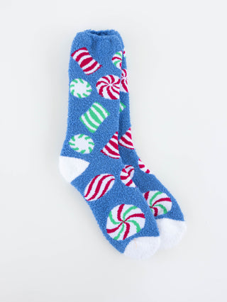 World's Softest blue socks with candy cane and peppermint pattern on a white background