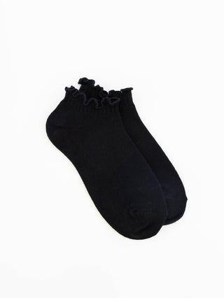 Women's black low-cut socks featuring a soft ruffle cuff made from a lightweight modal blend for everyday comfort.