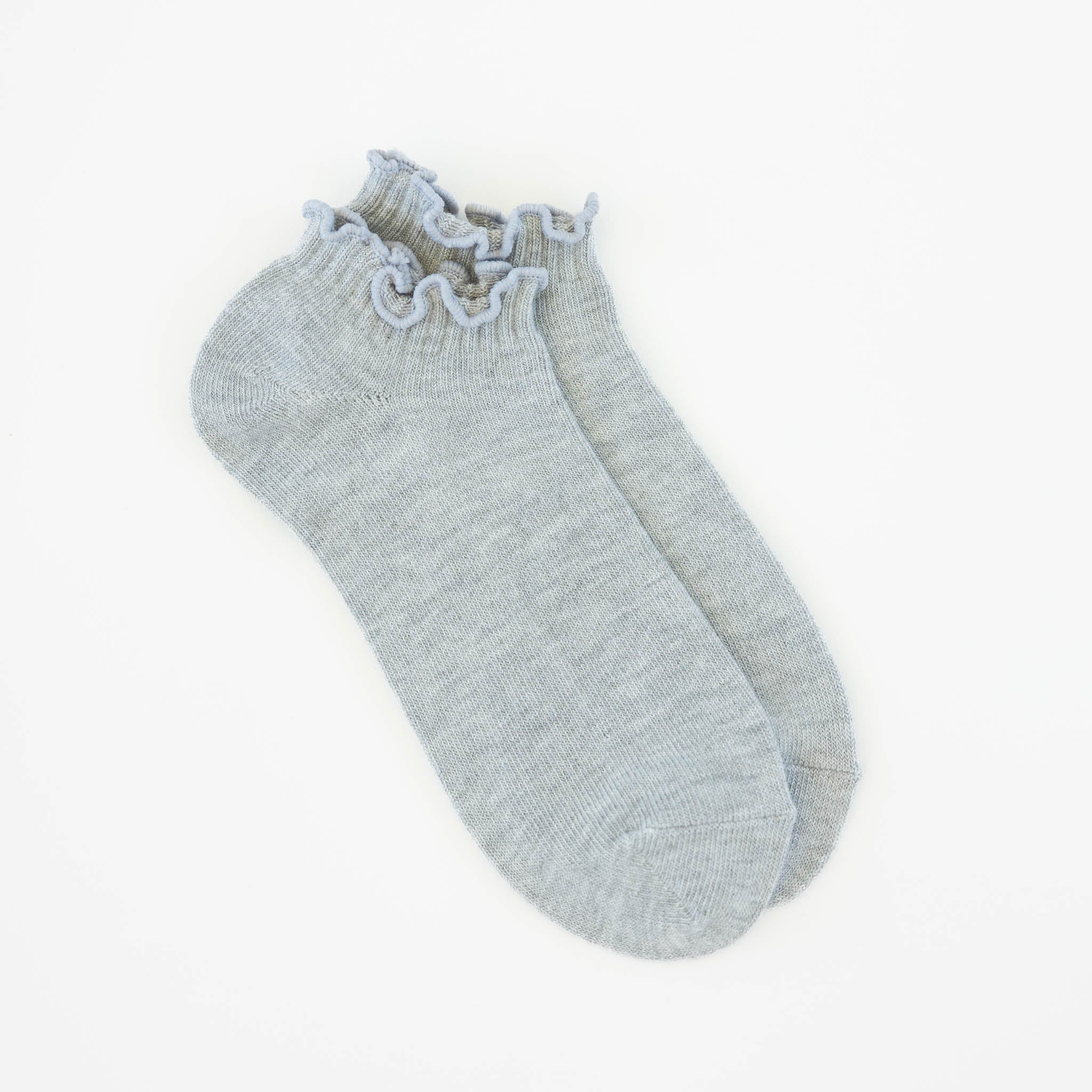 Pair of World's Softest light gray socks with lace trim on a white background