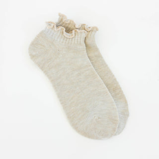 Women's heather oatmeal low-cut socks featuring a soft ruffle cuff made from a lightweight modal blend for everyday comfort.