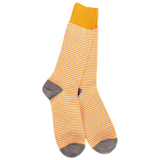 A pair of 1902 crew socks with thin orange and white horizontal stripes, featuring a solid mustard yellow cuff, gray heels, and gray toes, displayed against a plain white background.