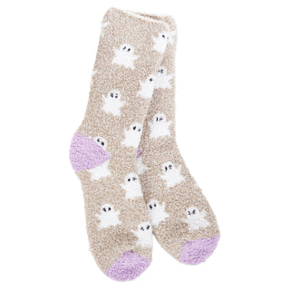 A pair of World's Softest beige sherpa socks with a pattern of white ghosts and light purple heels and toes, shown against a plain white background.