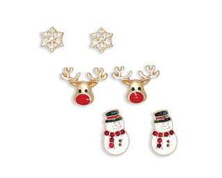 A set of  three holiday-themed gold-tone stud earrings on a plain white background, including a snowflake pair, a reindeer pair, and a snowman pair.