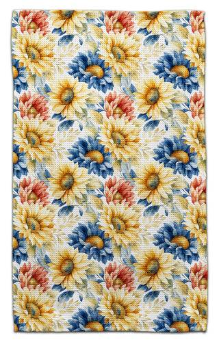 Floral patterned eco-friendly towel with sunflowers and blue flowers on a white background