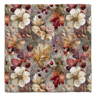 Floral leaf patterned washcloth with autumn colors on a gray background