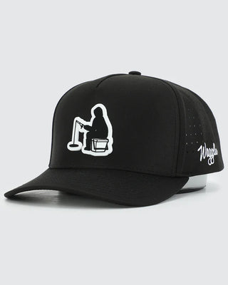 Three-quarter view of Waggle Frost Bite Snapback in black — ice fisherman embroidery patch with Waggle script on side panel
