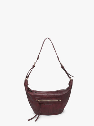 Brown leather handbag on a white background