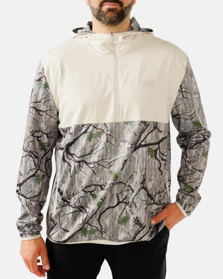 Waggle Men's Zenith Half-Zip Hoodie in Treed It camo — cream colorblock chest panel with tree branch print sleeves and body, front view
