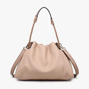Handbag with a textured surface on a white background