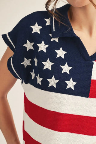 American flag patterned sweater with stars and stripes on a neutral background
