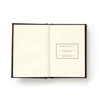 Open notebook with a title page on a white background