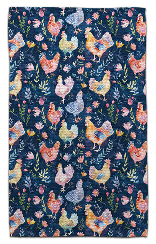 Eco-friendly waffle weave kitchen towel featuring colorful watercolor chickens and wildflowers on a navy blue background.
