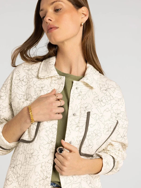 Claremont Jacket — dual chest pocket detail with contrast piping up close view of pocket and floral detail