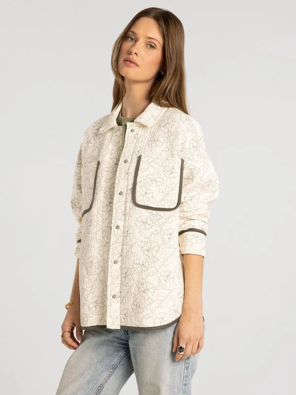 Claremont Jacket in ivory floral — women's snap button outerwear jacket, side view