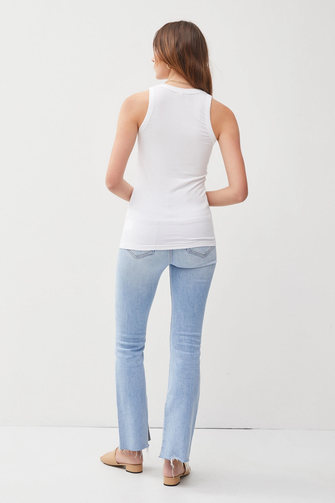 women wearing classic ribbed scoop neck tank tops in white back view