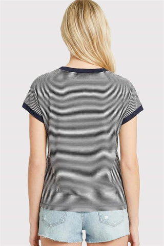 woman wearing navy color trimmed pinstripe top with contrast neckline and sleeves