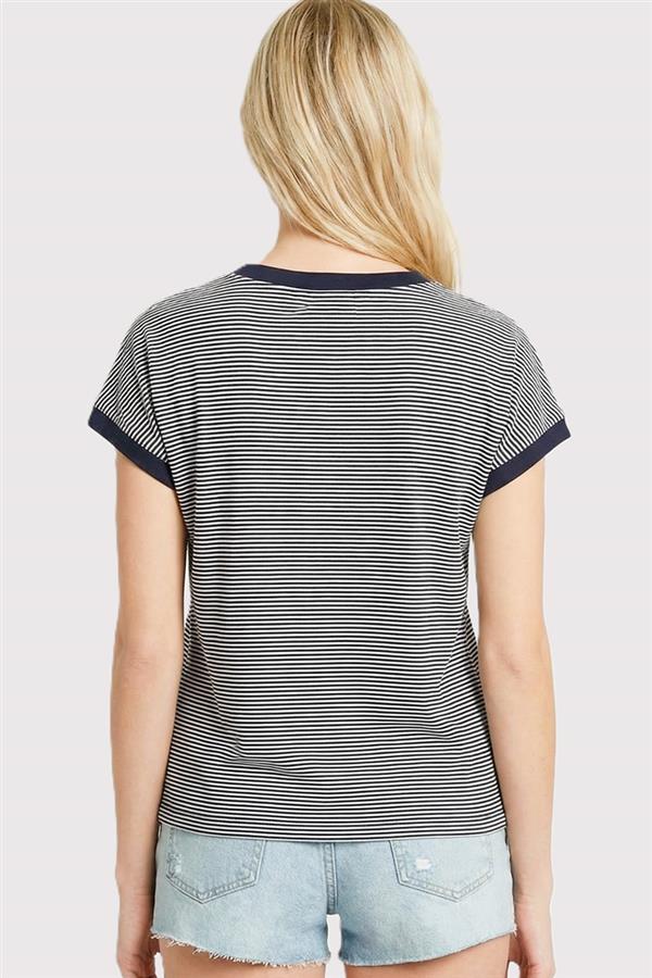 woman wearing navy color trimmed pinstripe top with contrast neckline and sleeves