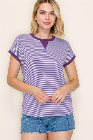 woman wearing purple color trimmed pinstripe top with contrast neckline and sleeves