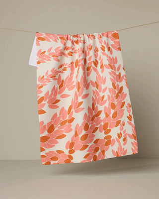 Coral and orange patterned eco-friendly kitchen tea towel by Geometry