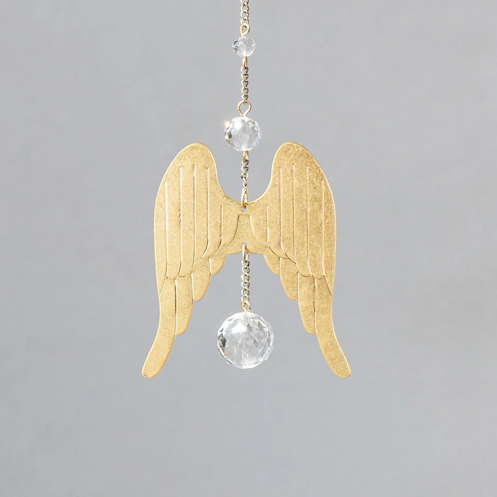 Scout Curated Wears Wings Protection mini crystal suncatcher featuring angel wing design with crystal prism and rainbow reflections