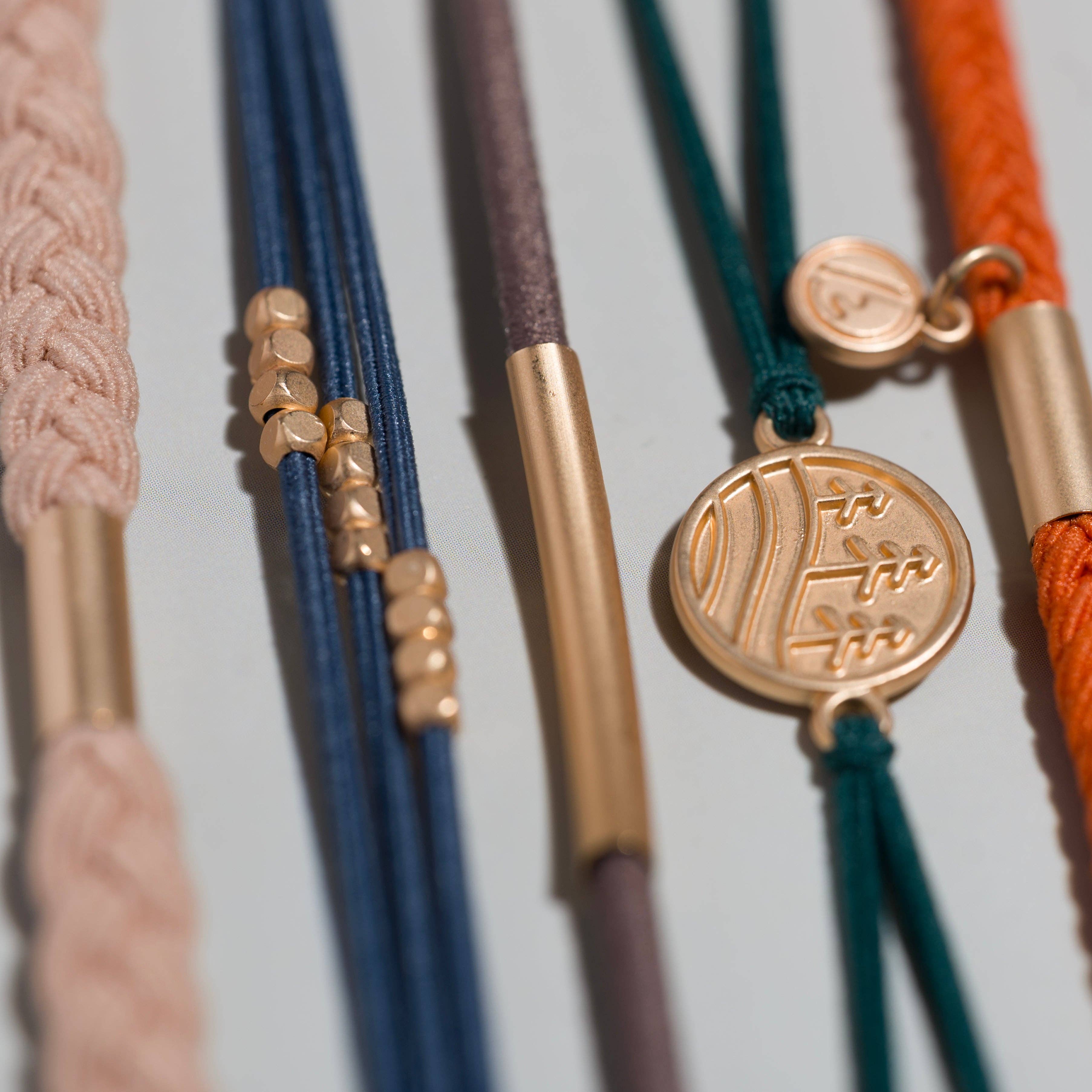 Discover Gold Pine Tree Charm Hair Tie Bracelets by K'lani