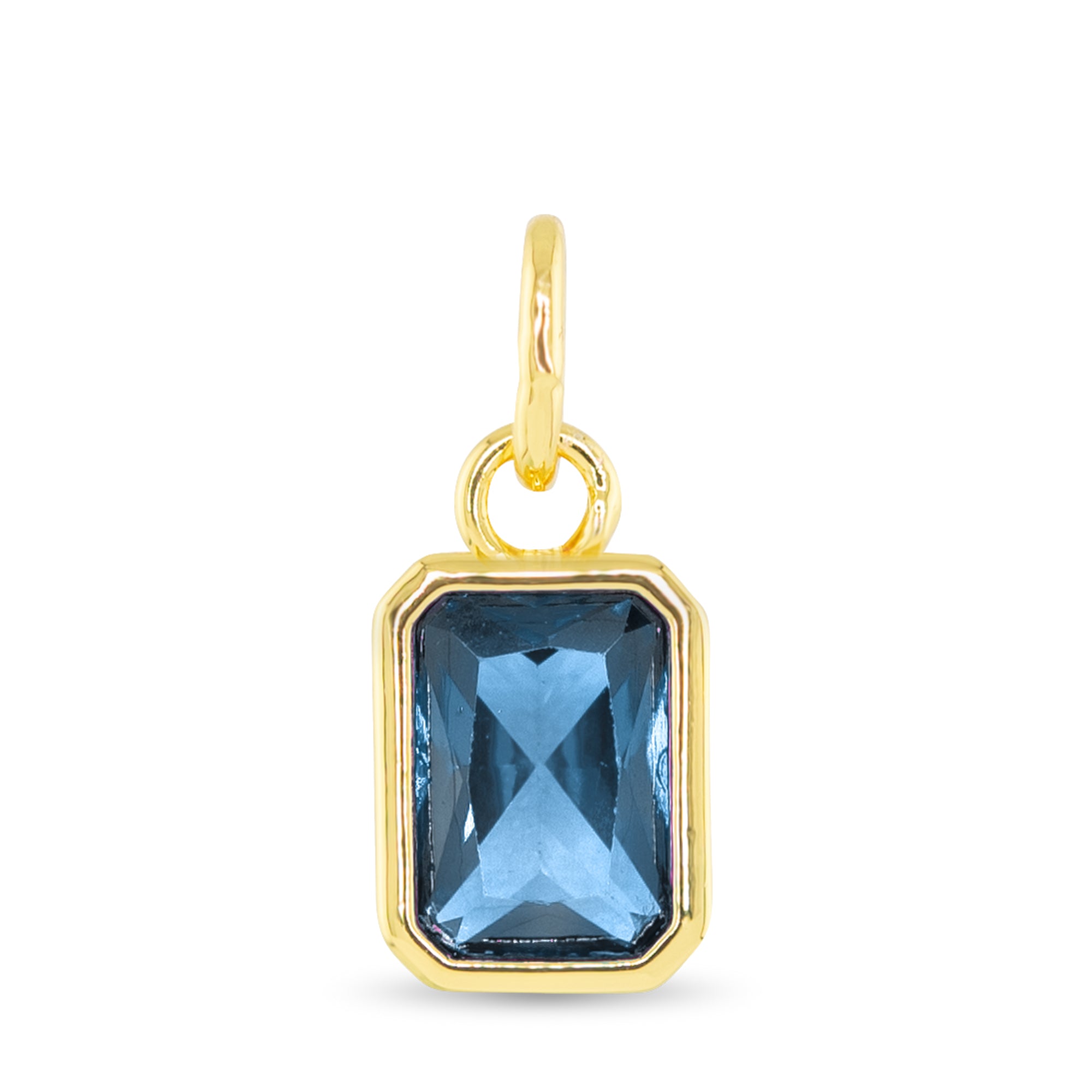 December birthstone charm with blue topaz-inspired faceted stone and 18K gold dipped setting